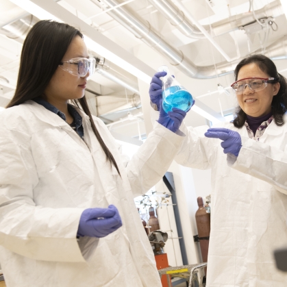 Graduate student works with a professor in the ChemBio lab