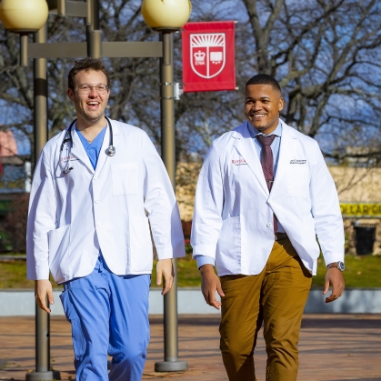NJMS medical students walk on the Newark health campus