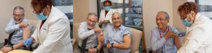 Two people smile after receiving their flu shots